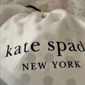 Kate Spade White Polka Dot Bag
Alice in Wonderland Teapot bag